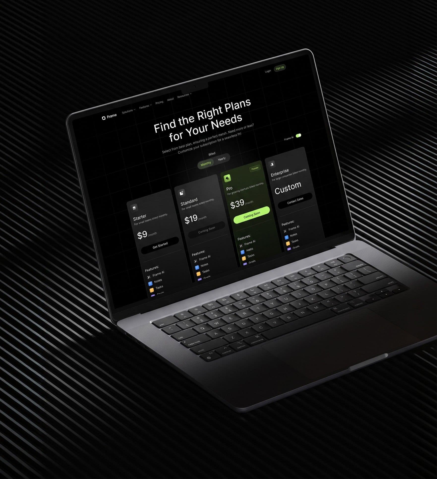 The pricing page open on a laptop, Find the Right Plans for Your Needs