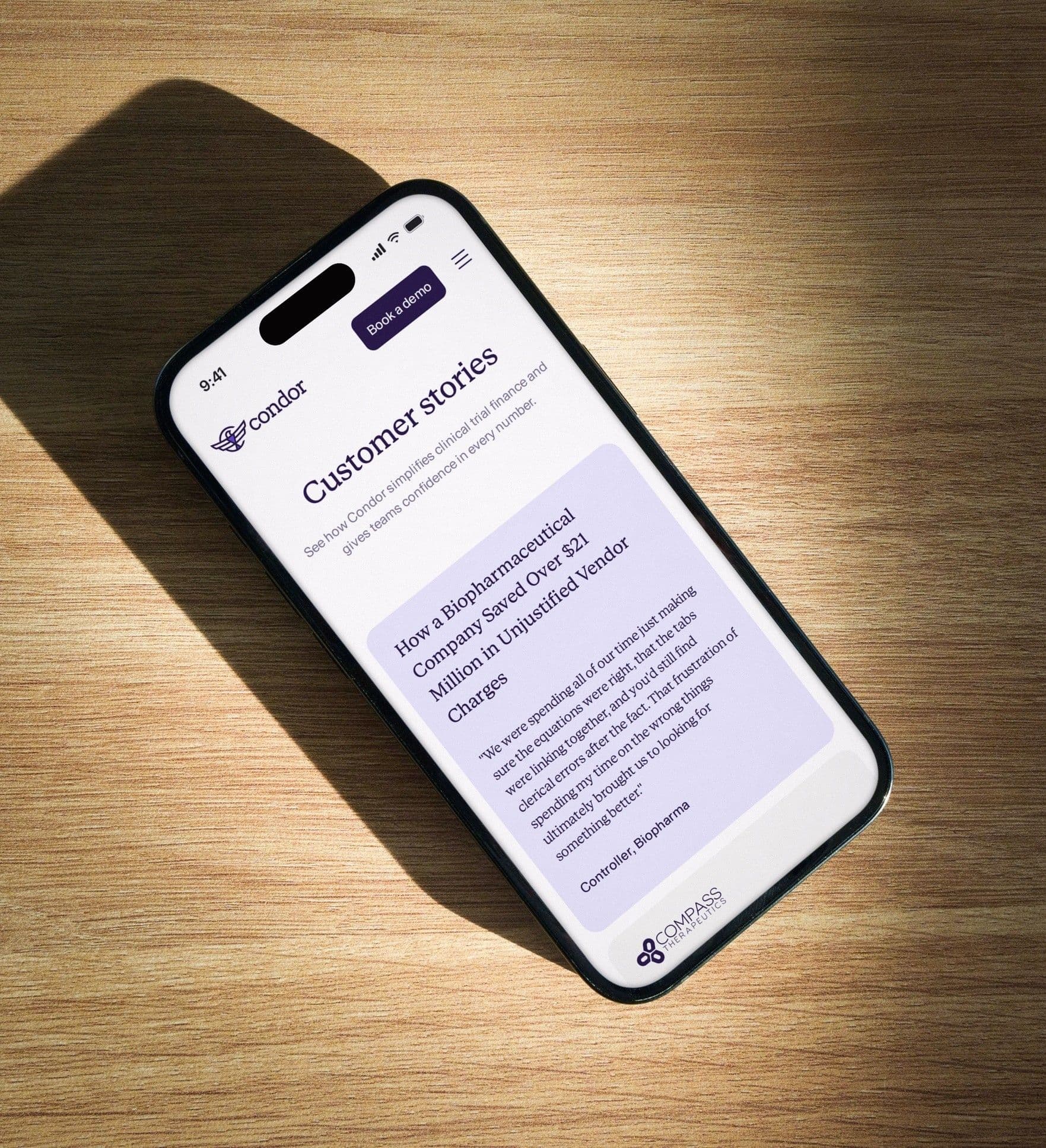 Customer stories on an iPhone lying on a sunlit desk