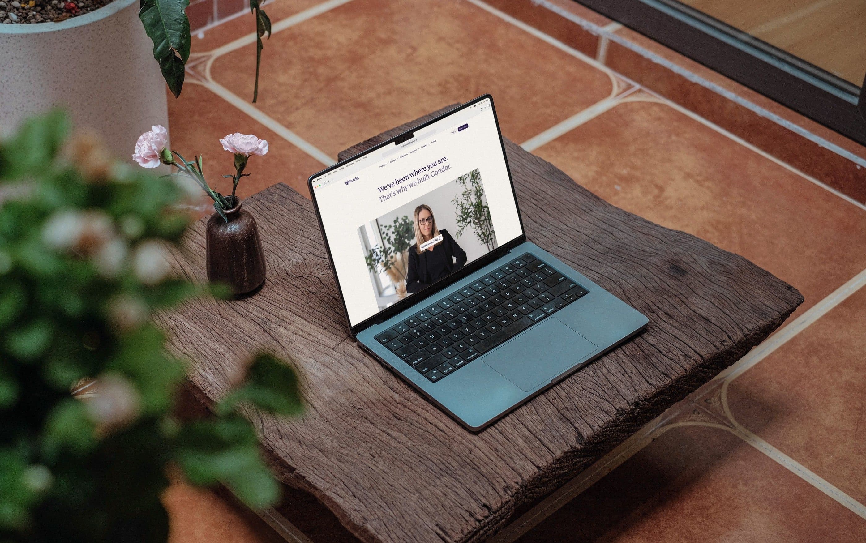 The About page, We've been where you are, on a MacBook on a rustic wooden table