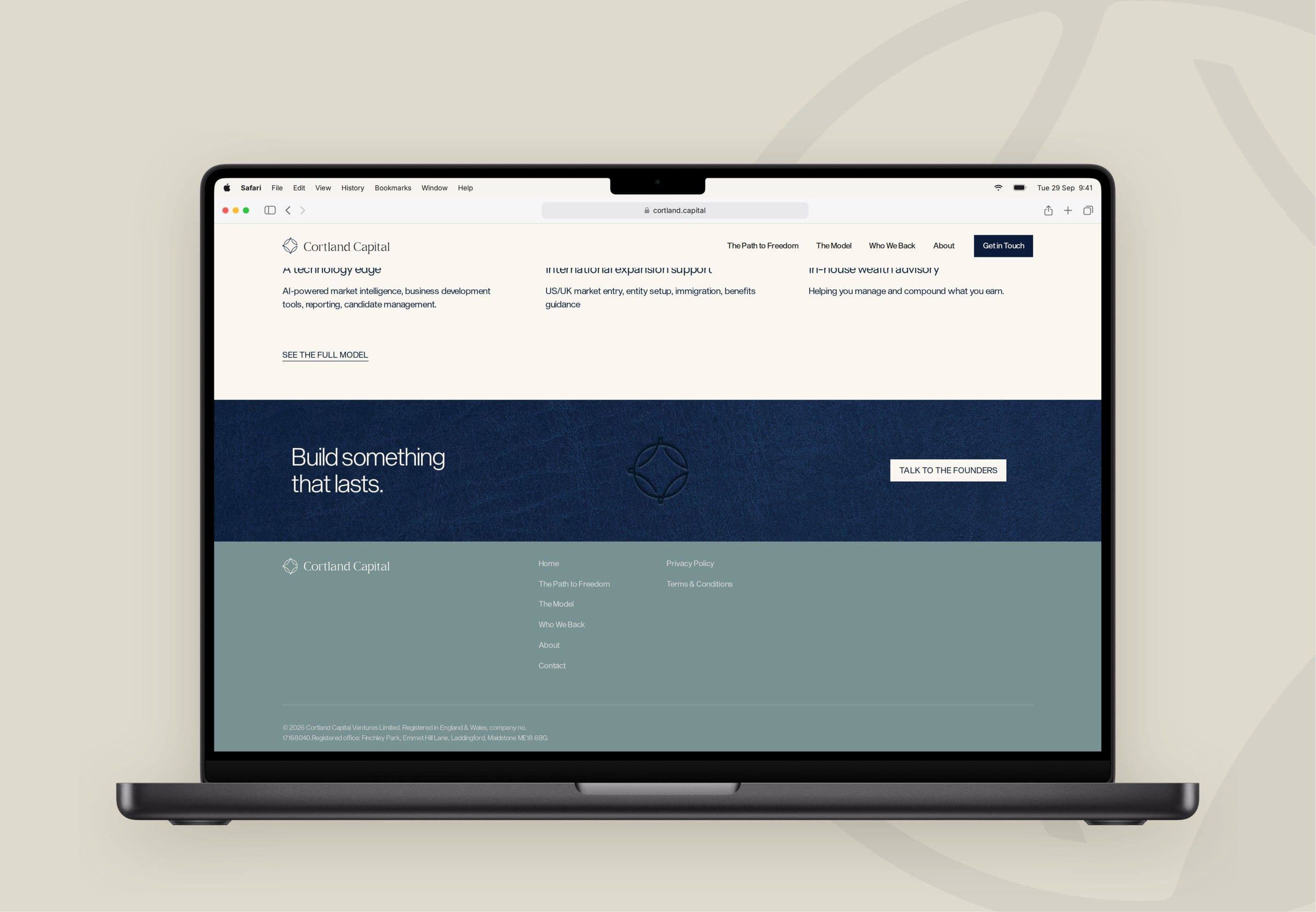 A walk through the live site on a MacBook: page load, two page transitions and a scroll to the footer